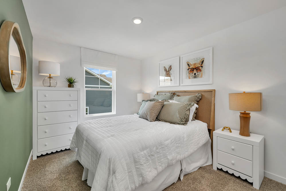 2140 Bodega Road Oswego, IL 60543 - Photo 17 of 22 a bedroom with a bed and a window