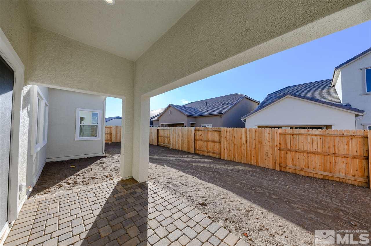 9485 Flying Horse Road, Unit HOMESITE 115 Reno, NV 89521 - Photo 17 of 19 a view of a backyard of a house