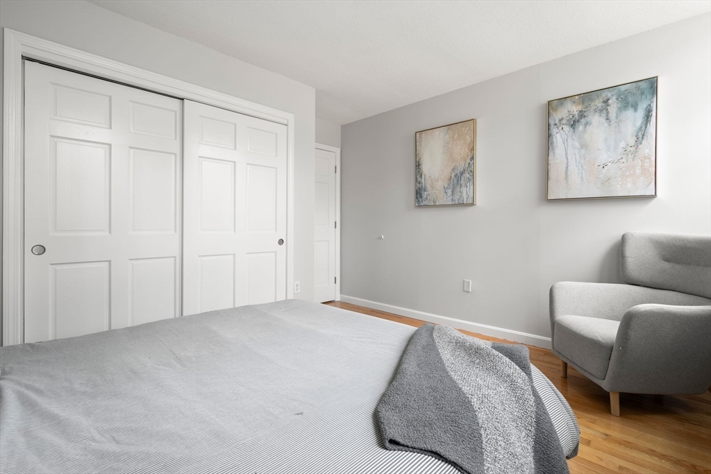 35 Eldridge Road, Unit 202 Boston, MA 02130 - Photo 14 of 31 a view of room with furniture and wooden floor