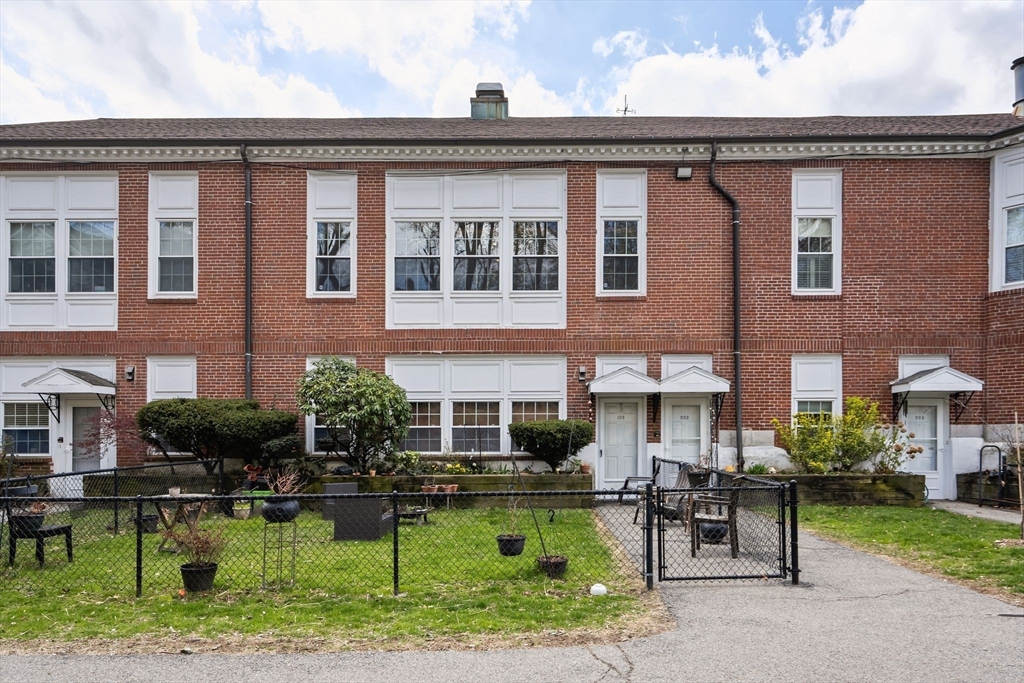 35 Eldridge Road, Unit 202 Boston, MA 02130 - Photo 21 of 31 a view of house with a yard chairs and a table