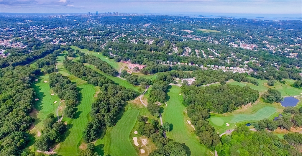 35 Eldridge Road, Unit 202 Boston, MA 02130 - Photo 28 of 31 an aerial view of residential houses with city and green space