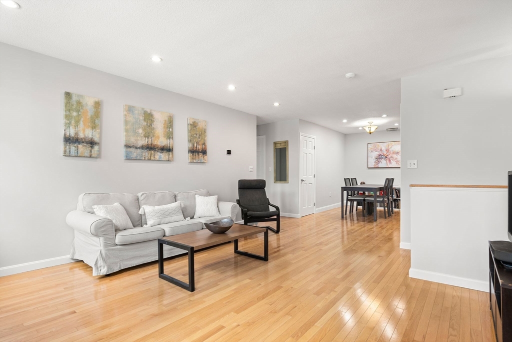 35 Eldridge Road, Unit 202 Boston, MA 02130 - Photo 7 of 31 a living room with furniture and a table
