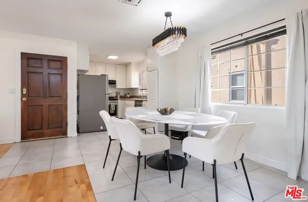 a view of a dining room with furniture