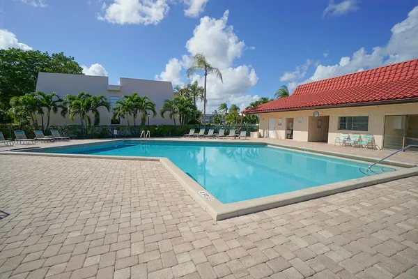 a view of a house with swimming pool