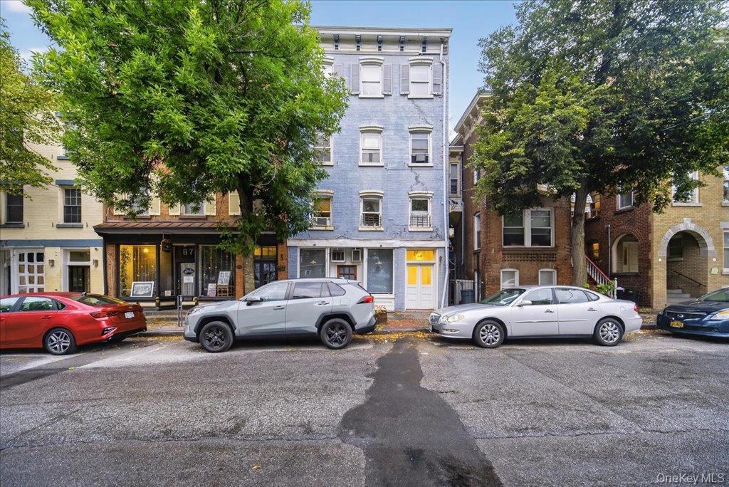 89 Liberty Street Newburgh, NY 12550 - Photo 2 of 33 a cars parked in front of a building