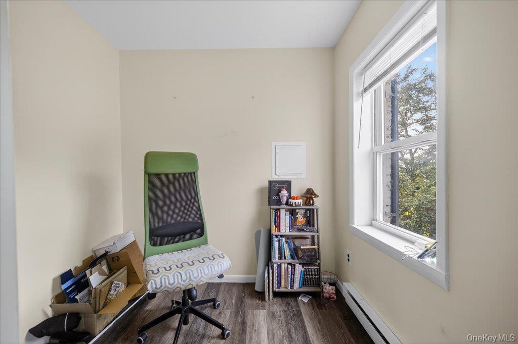 89 Liberty Street Newburgh, NY 12550 - Photo 26 of 33 a view of a workspace with furniture and a window