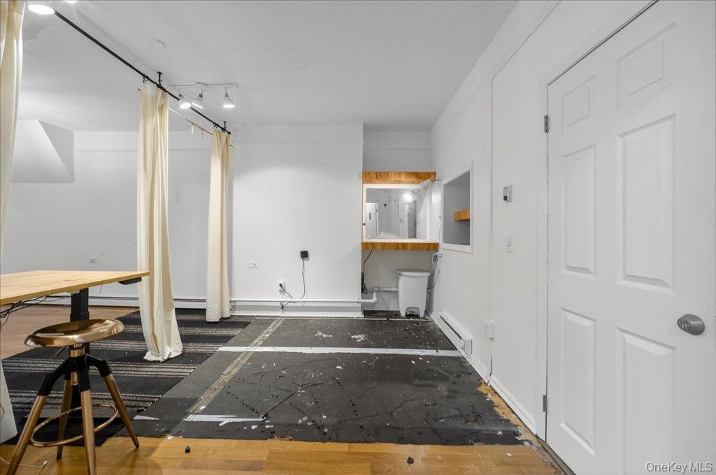 89 Liberty Street Newburgh, NY 12550 - Photo 8 of 33 a view of an entryway with wooden floor