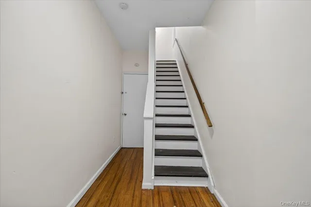 a view of entryway with wooden floor