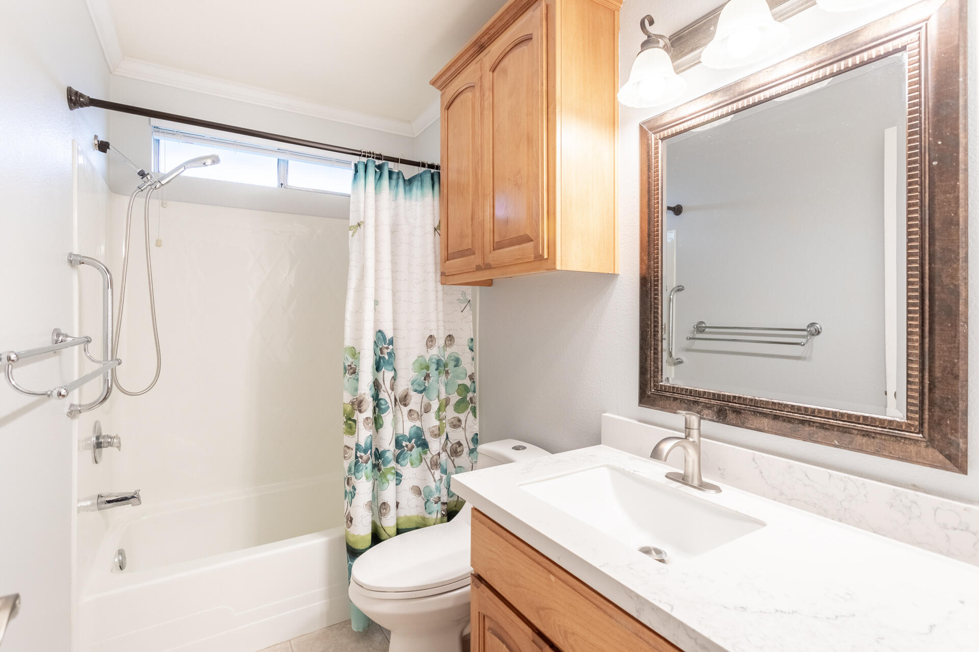 6766 Drake Drive Anderson, CA 96007 - Photo 27 of 44 a bathroom with a sink vanity granite toilet and shower