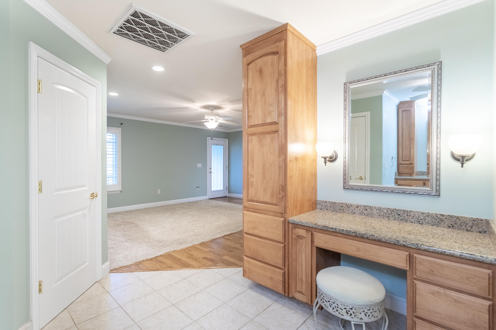 6766 Drake Drive Anderson, CA 96007 - Photo 30 of 44 a bathroom with a granite countertop sink and a mirror