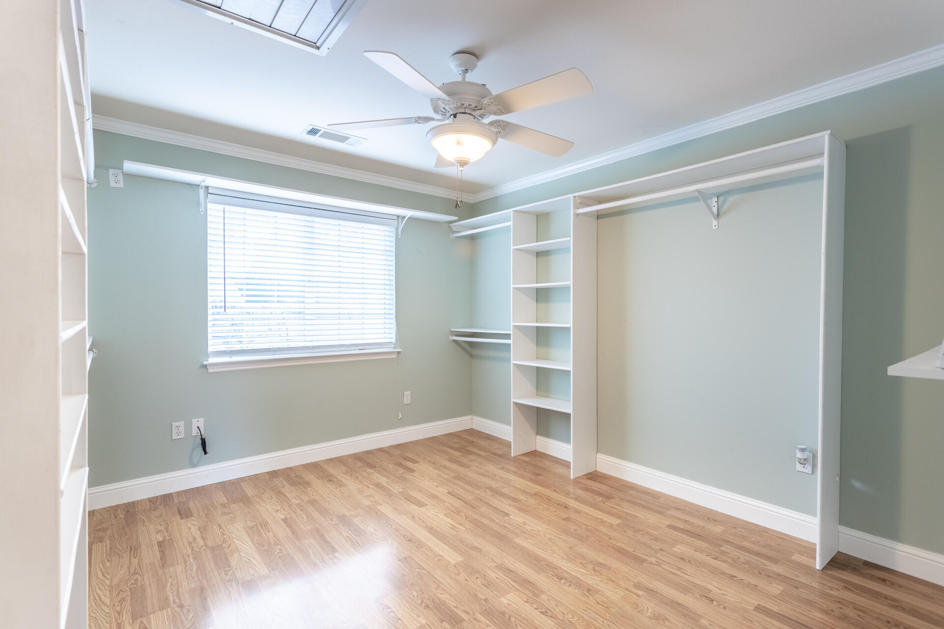 6766 Drake Drive Anderson, CA 96007 - Photo 42 of 44 a view of a livingroom with a ceiling fan and wooden floor