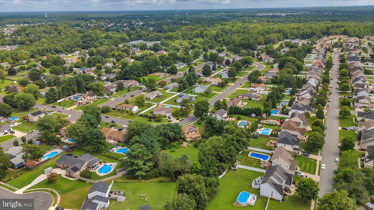50 Wayside Road Berlin, NJ 08009 - Photo 28 of 35 Serene suburban landscape with pools.