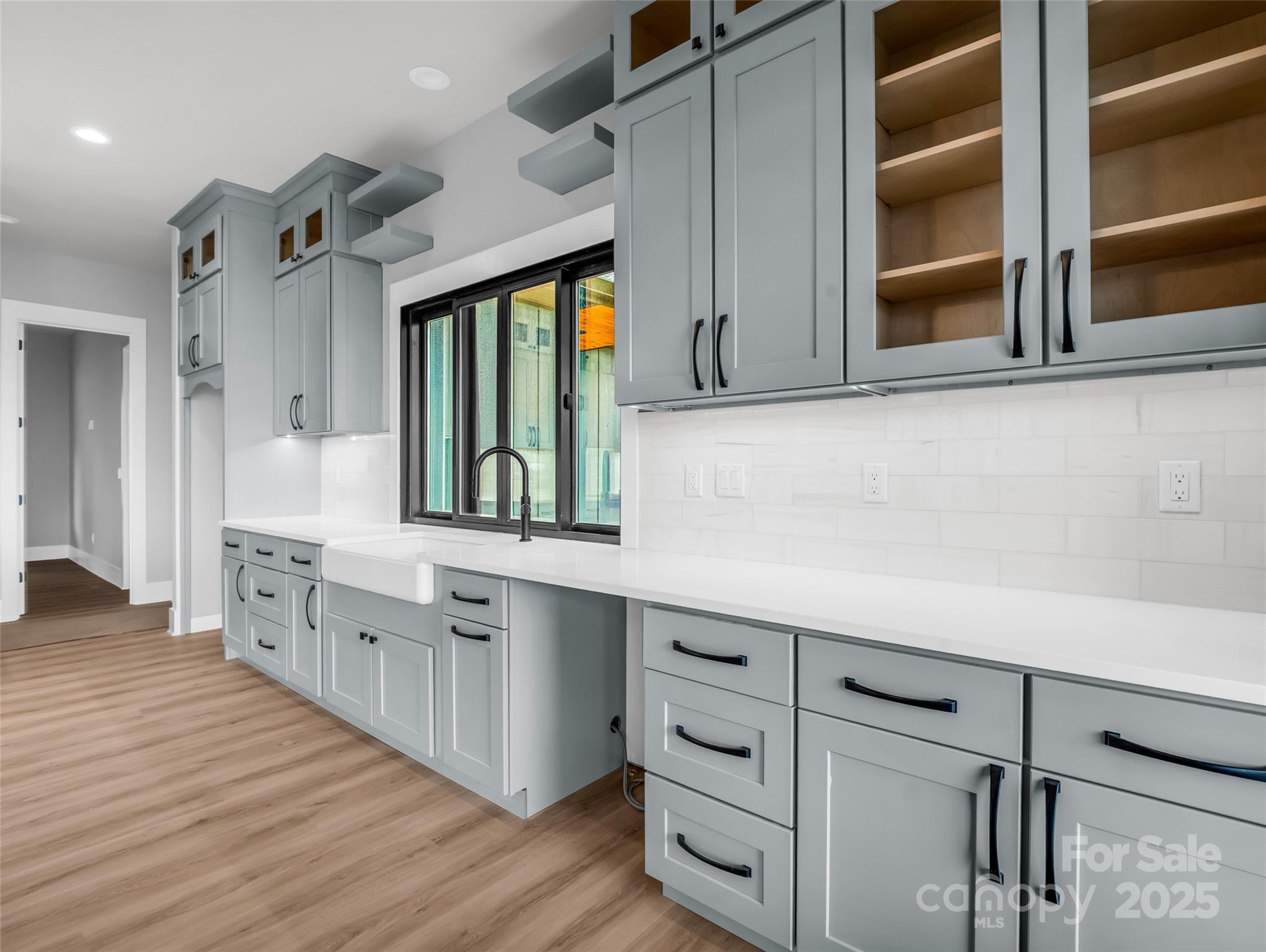 93 Chesterfield Drive Mill Spring, NC 28756 - Photo 13 of 48 a large kitchen with cabinets