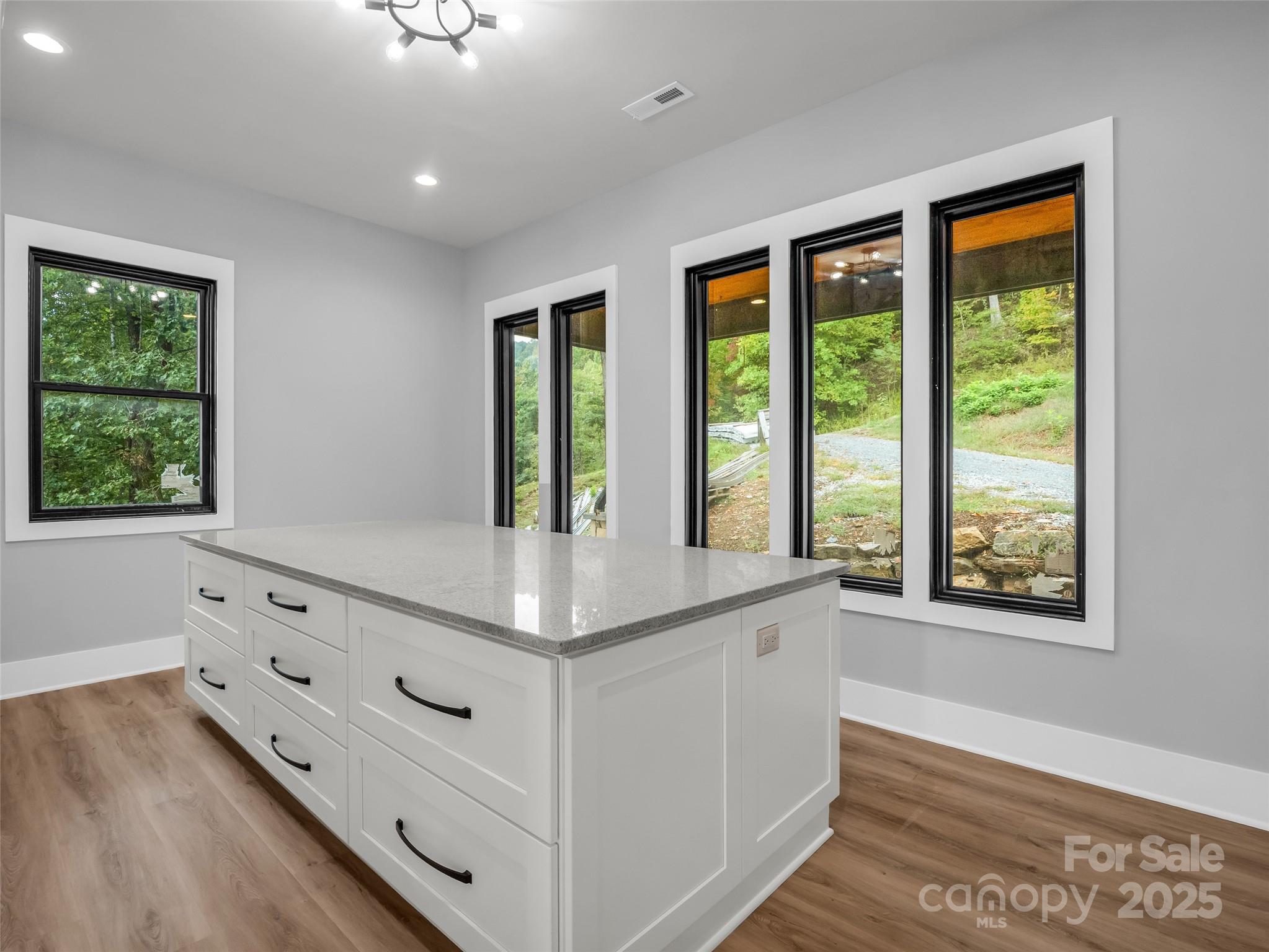 93 Chesterfield Drive Mill Spring, NC 28756 - Photo 21 of 48 a room with window and bed