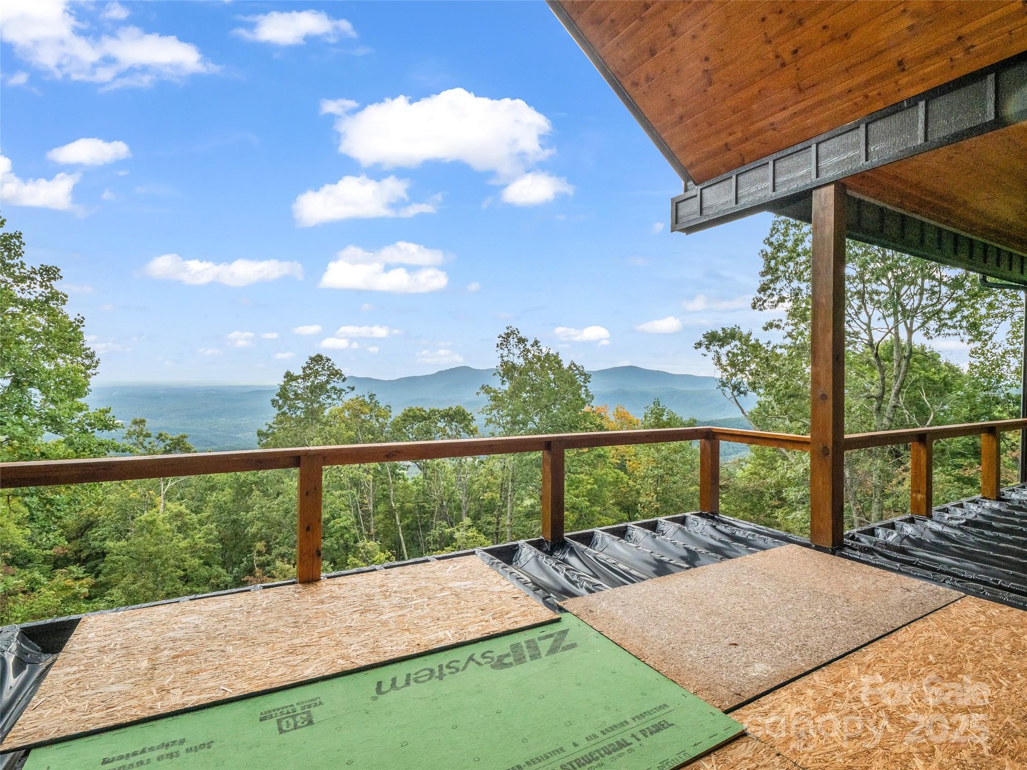 93 Chesterfield Drive Mill Spring, NC 28756 - Photo 25 of 48 a view of balcony with deck and wooden floor
