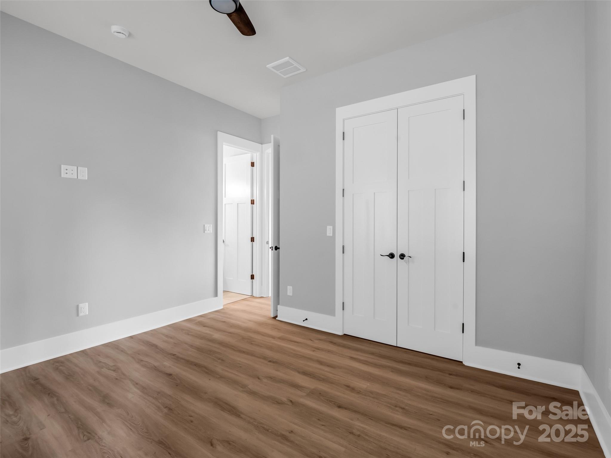 93 Chesterfield Drive Mill Spring, NC 28756 - Photo 28 of 48 a view of an empty room with wooden floor