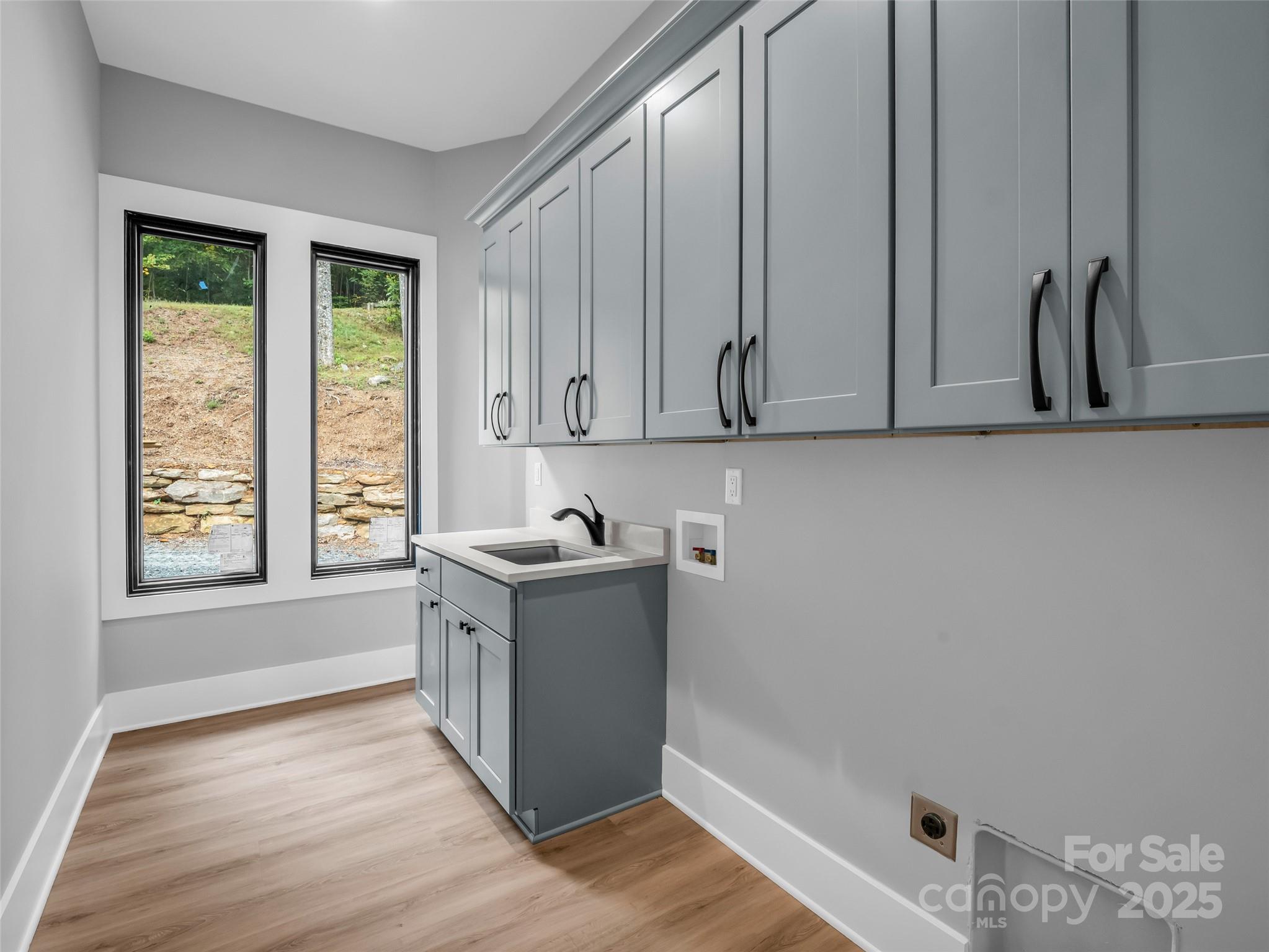 93 Chesterfield Drive Mill Spring, NC 28756 - Photo 30 of 48 a view of kitchen with furniture and wooden floor