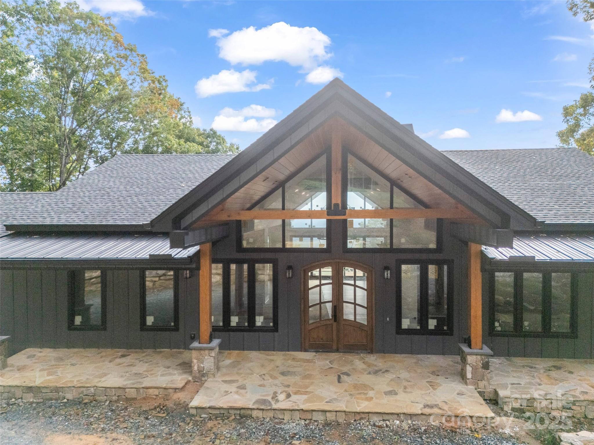 93 Chesterfield Drive Mill Spring, NC 28756 - Photo 3 of 48 a front view of a house