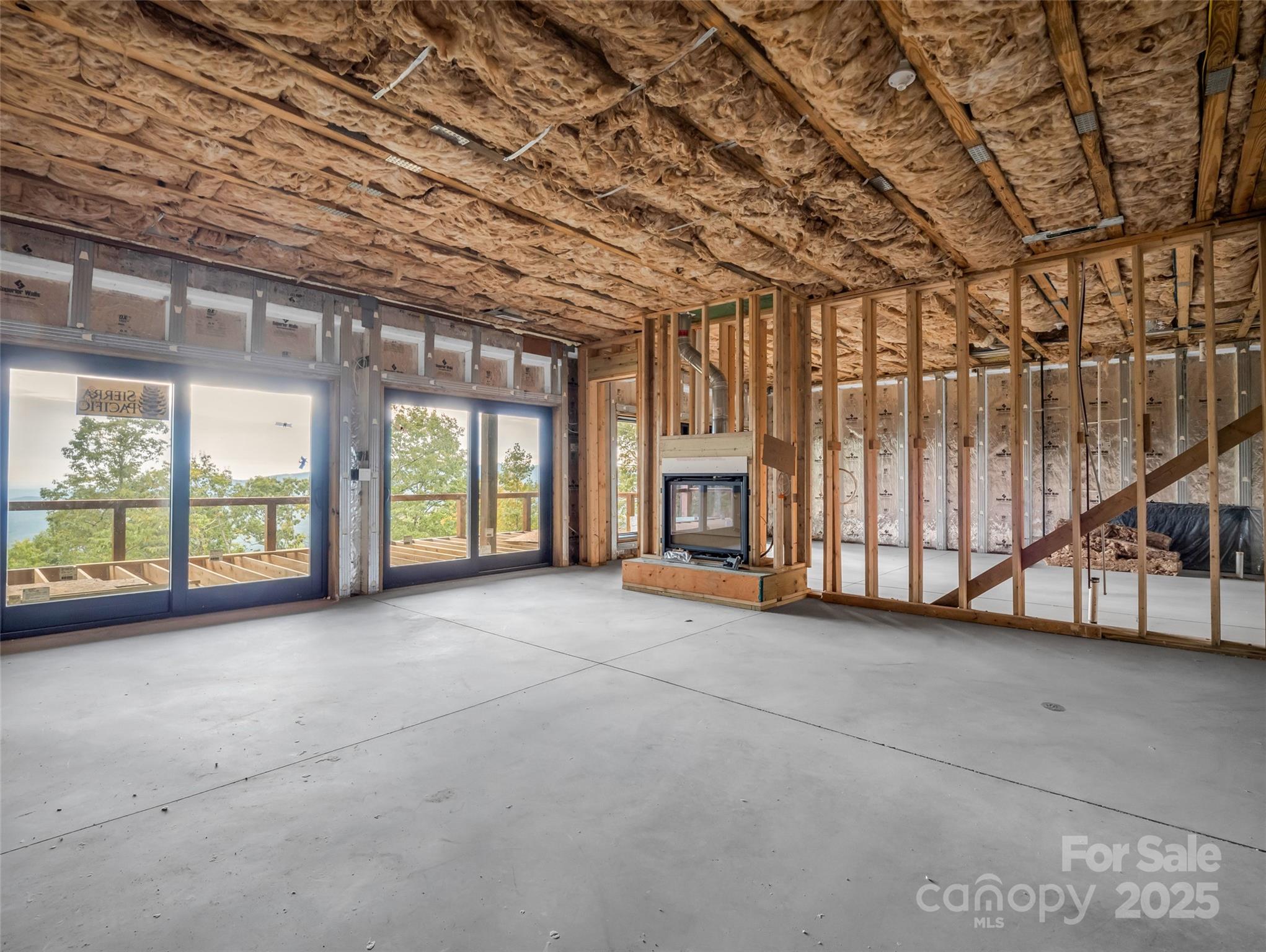 93 Chesterfield Drive Mill Spring, NC 28756 - Photo 34 of 48 a view of an empty room with windows