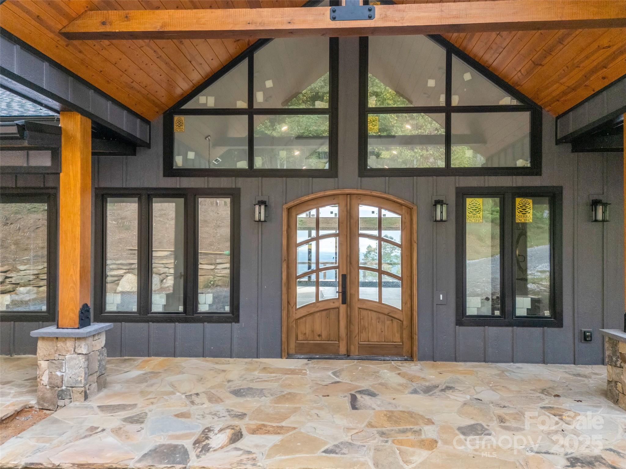 93 Chesterfield Drive Mill Spring, NC 28756 - Photo 4 of 48 a view of a front door of house