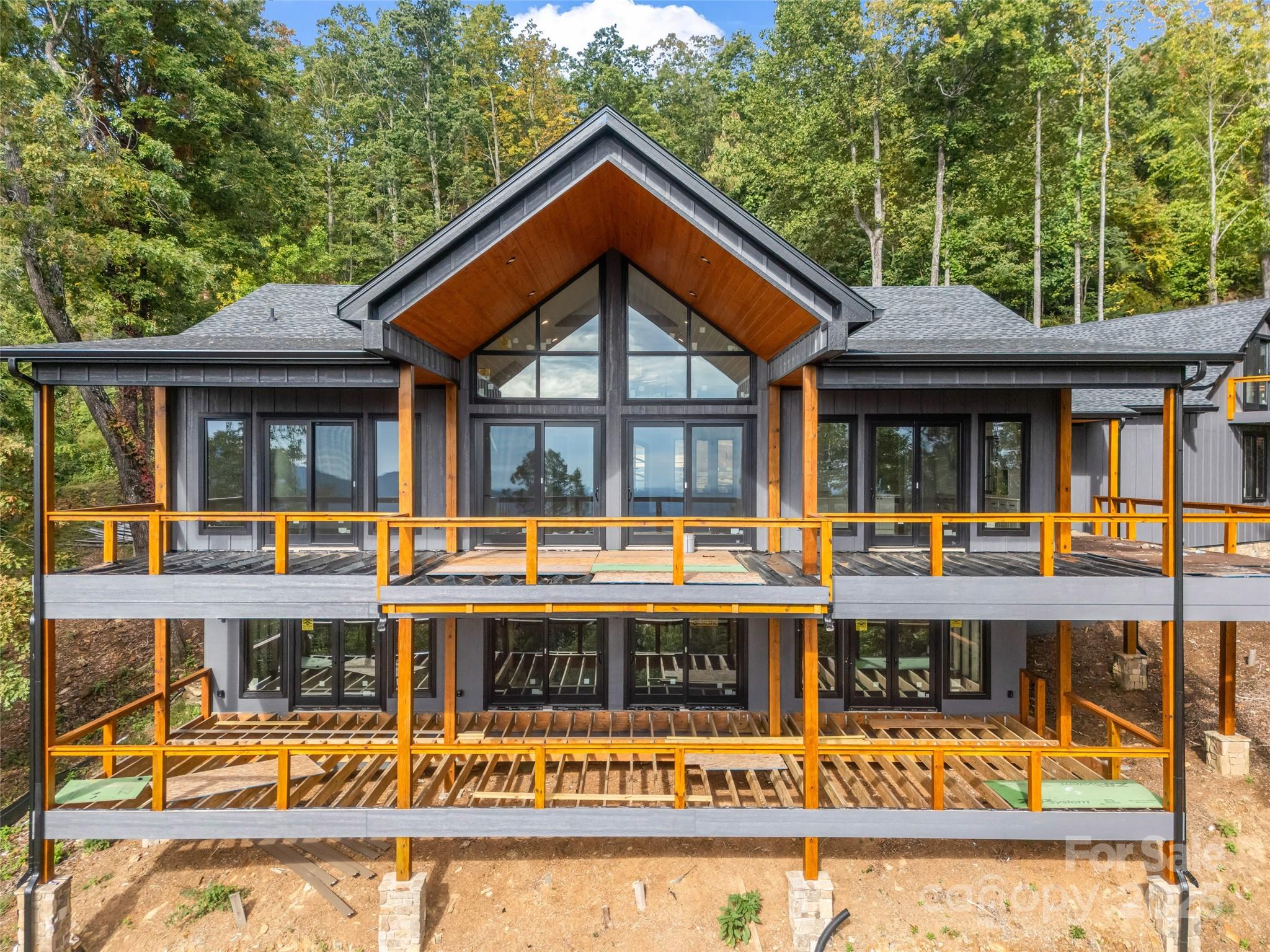 93 Chesterfield Drive Mill Spring, NC 28756 - Photo 44 of 48 a view of house with swimming pool and outdoor seating