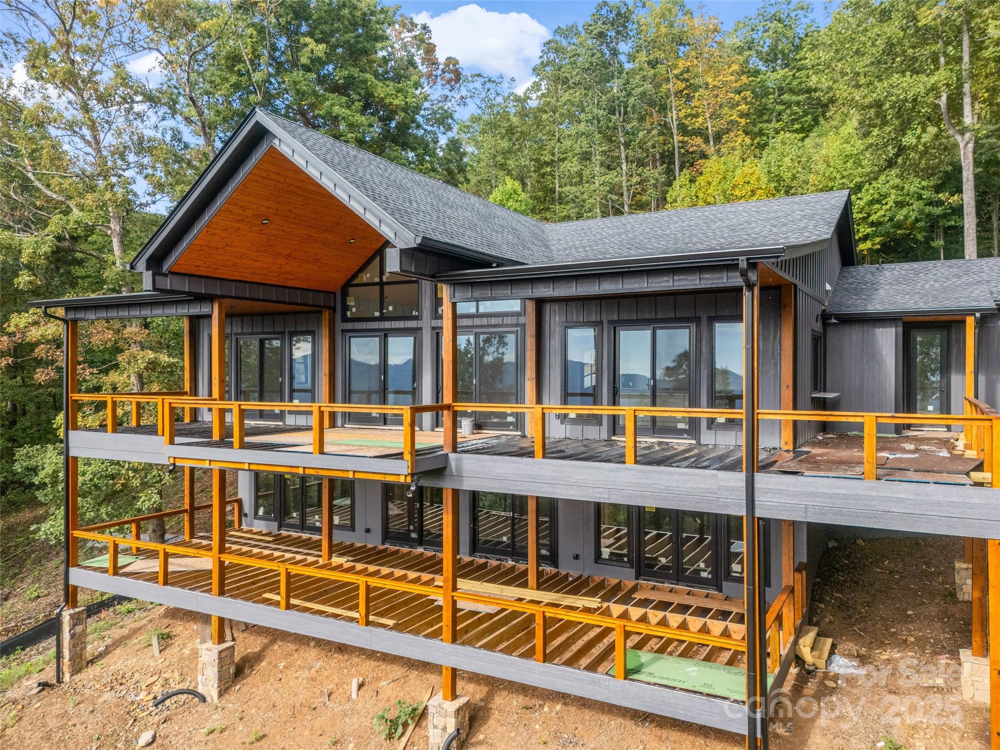 93 Chesterfield Drive Mill Spring, NC 28756 - Photo 45 of 48 front view of a house with a swimming pool