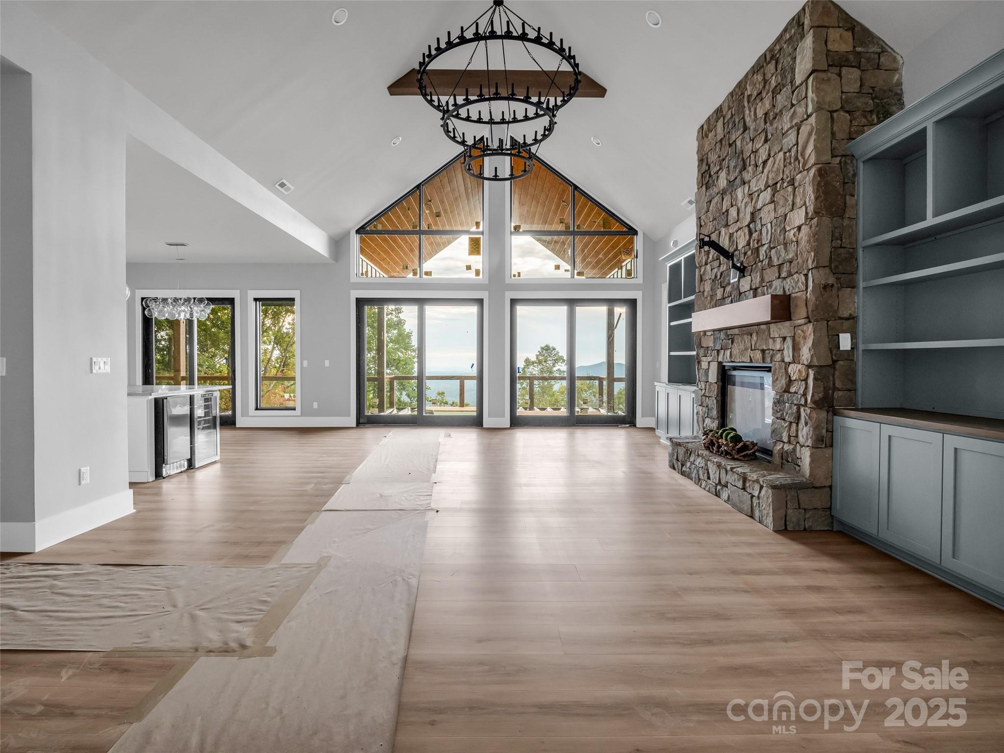 93 Chesterfield Drive Mill Spring, NC 28756 - Photo 5 of 48 a view of livingroom with hardwood floor and a ceiling fan