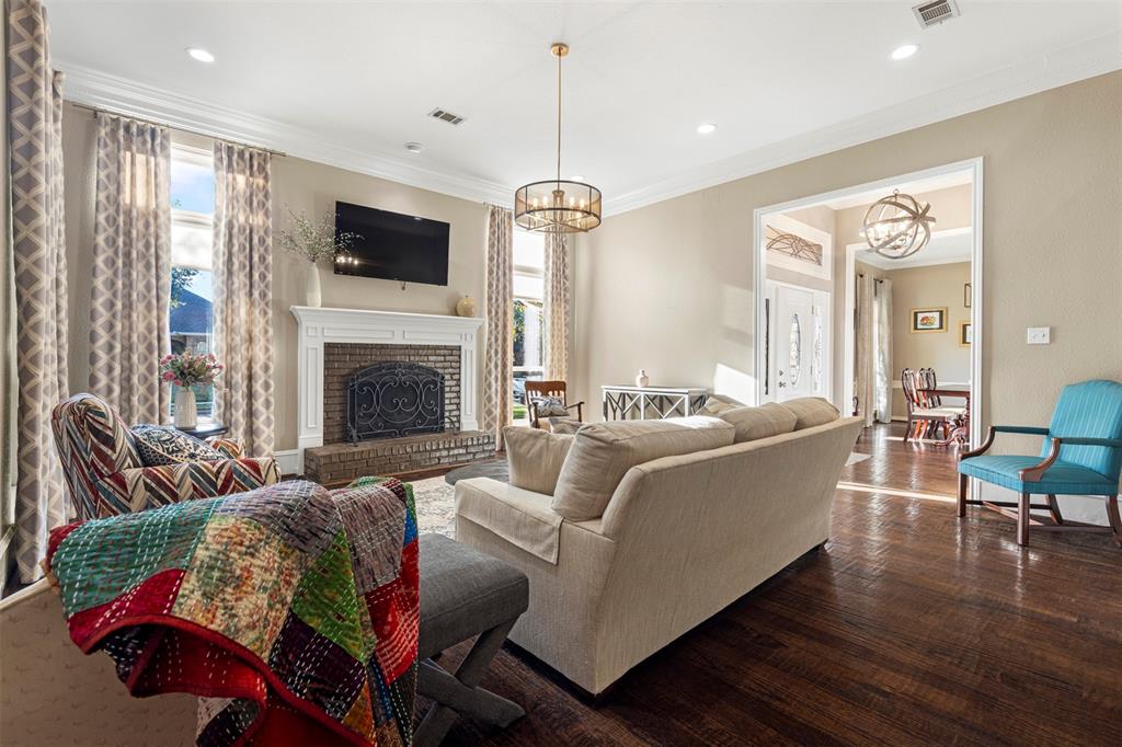 6306 Chelsea Way Garland, TX 75044 - Photo 3 of 37 Front Living area with fireplace