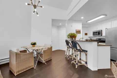 a view of a workspace with furniture and a livingroom