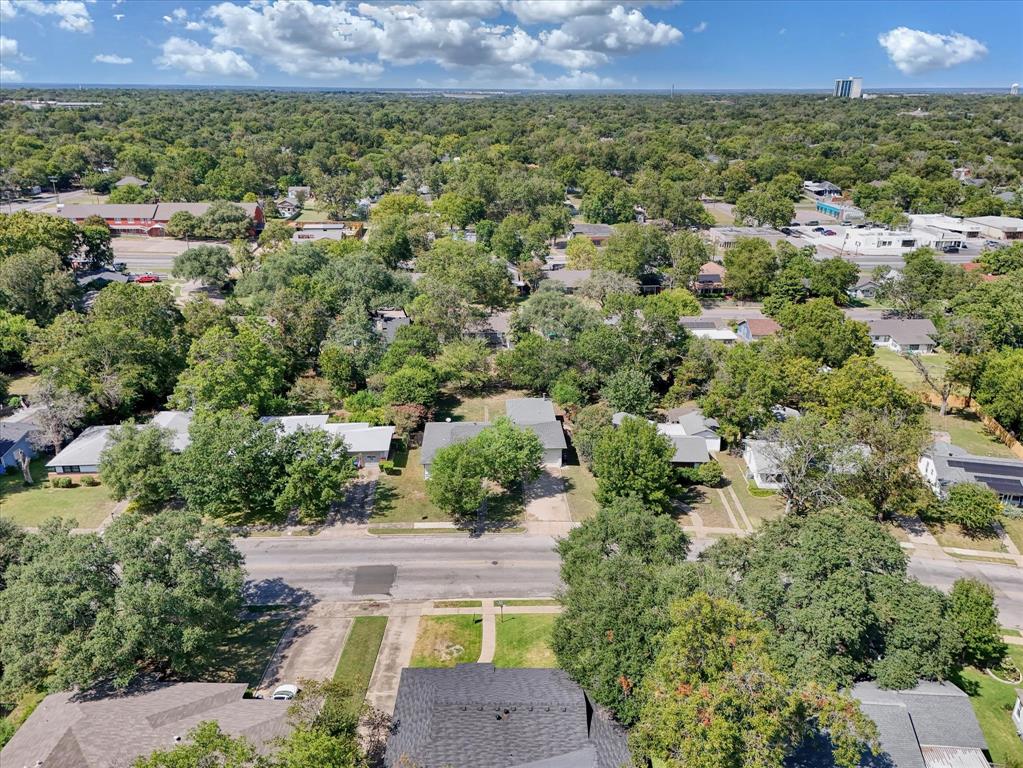1325 Sunset Street Waco, TX 76710 - Photo 39 of 40 Aerial perspective of suburban area featuring a forest