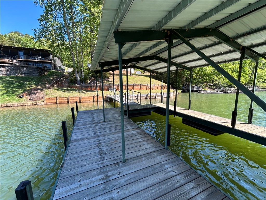 43 Sunset Cove Road Abbeville, SC 29620 - Photo 33 of 41 This tranquil waterfront retreat offers private access and serene lake views.