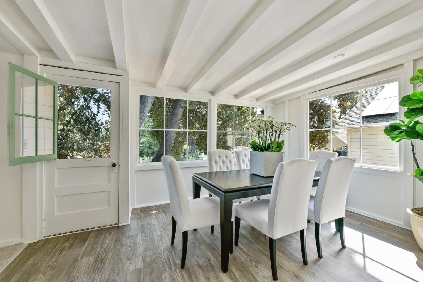 132 Alta Vista Road Woodside, CA 94062 - Photo 11 of 44 a dining room with furniture window wooden floor