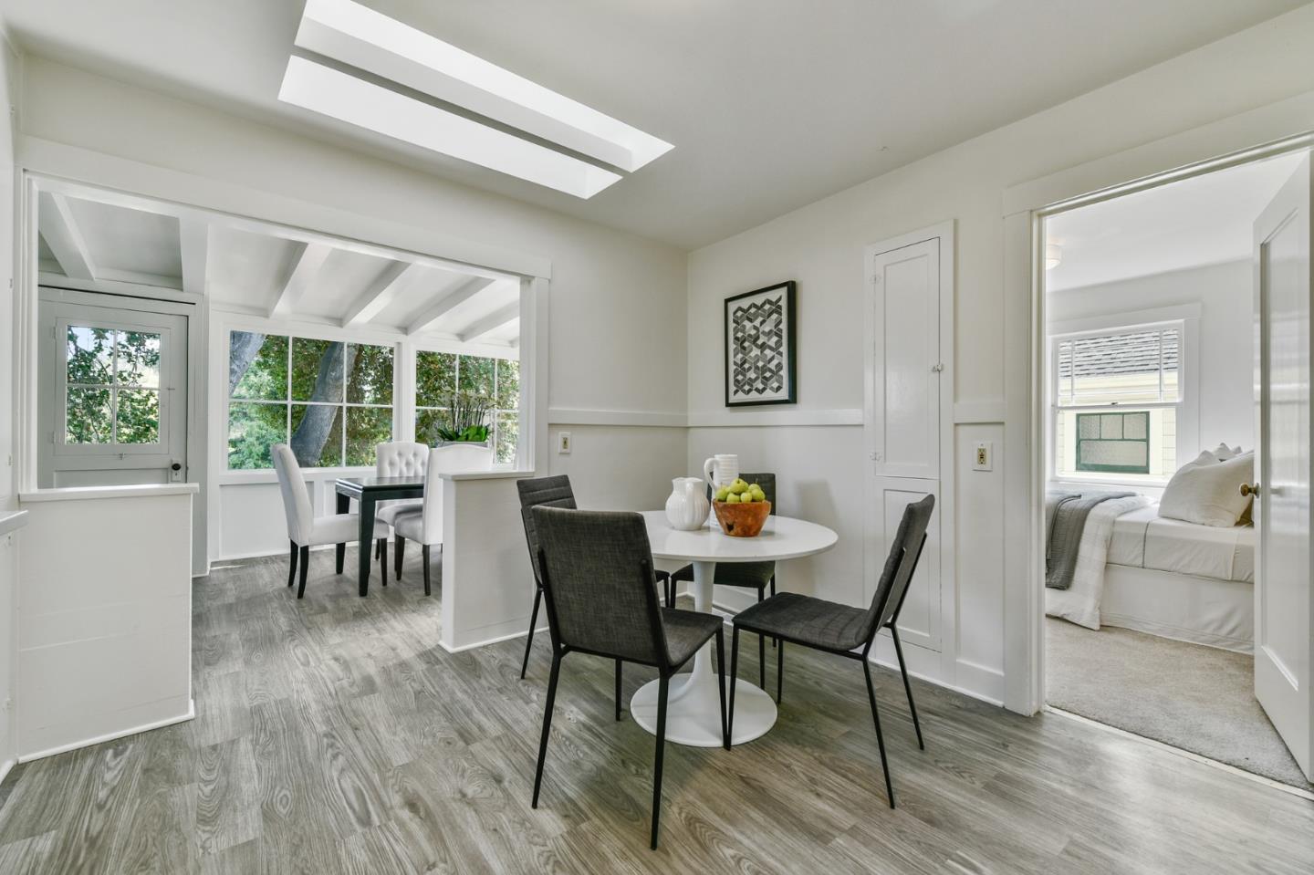 132 Alta Vista Road Woodside, CA 94062 - Photo 16 of 44 a view of a dining room with furniture and a large window