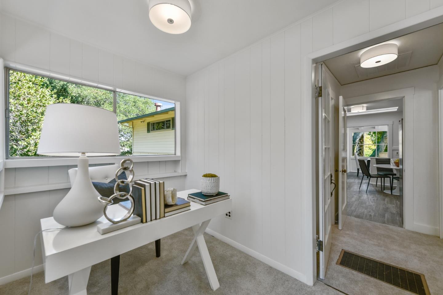 132 Alta Vista Road Woodside, CA 94062 - Photo 18 of 44 a dining room with furniture and a window