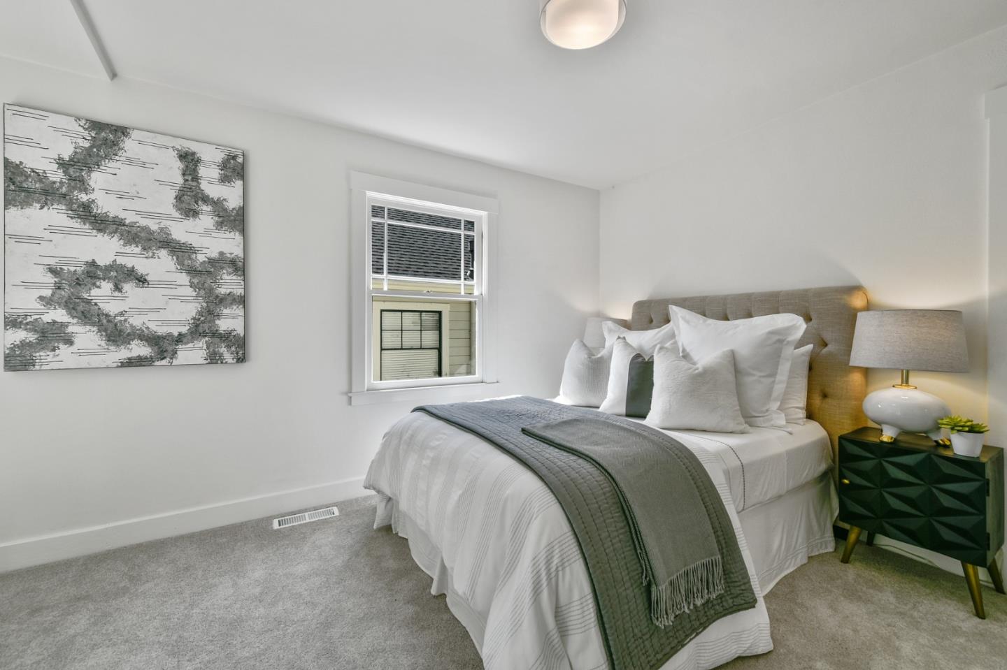 132 Alta Vista Road Woodside, CA 94062 - Photo 23 of 44 a bed room with a bed and a window