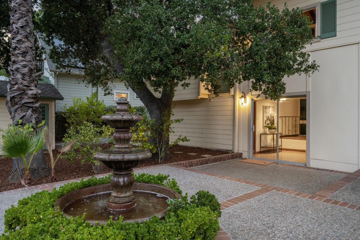 132 Alta Vista Road Woodside, CA 94062 - Photo 29 of 44 a front view of a house with garden