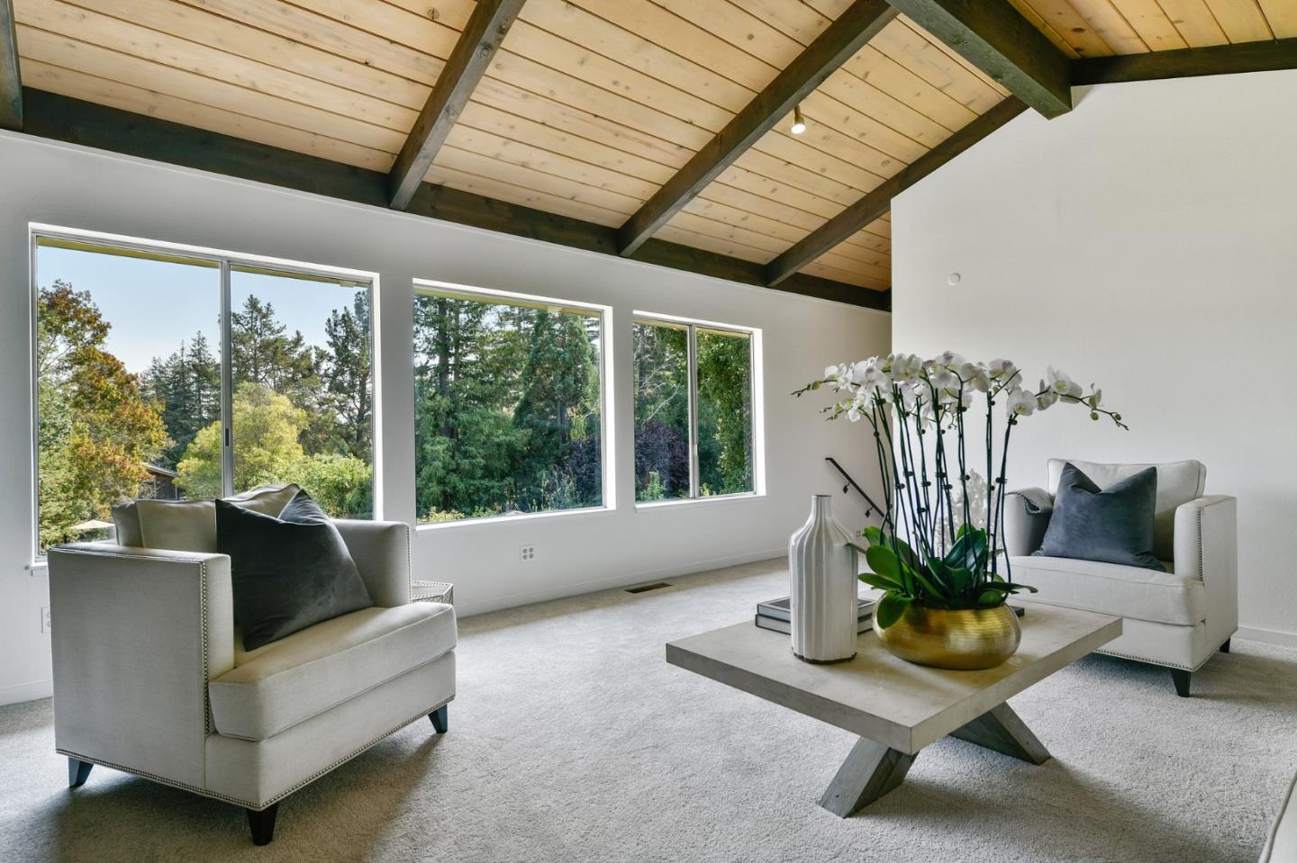 132 Alta Vista Road Woodside, CA 94062 - Photo 5 of 44 a living room with furniture potted plant and a large window