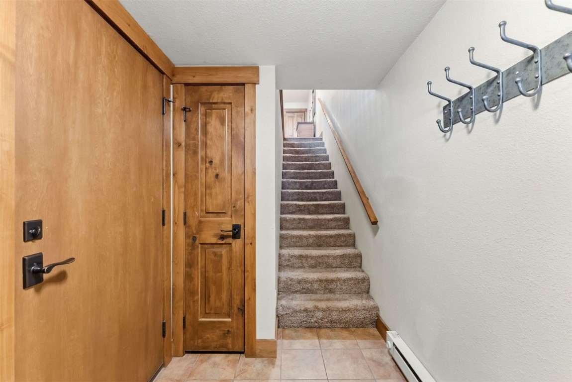 1682 Boreas Pass Road, Unit C Breckenridge, CO 80424 - Photo 39 of 50 Stairs to home from the entry and garage