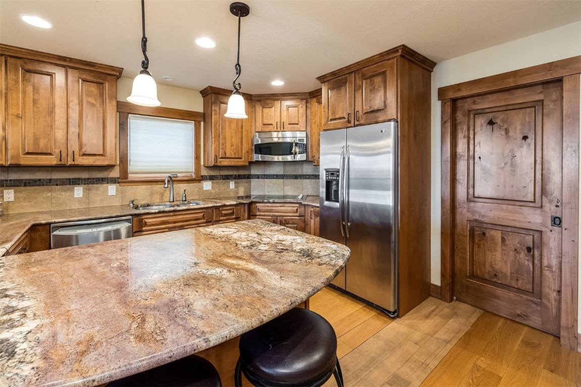 1682 Boreas Pass Road, Unit C Breckenridge, CO 80424 - Photo 4 of 50 Kitchen island with seating