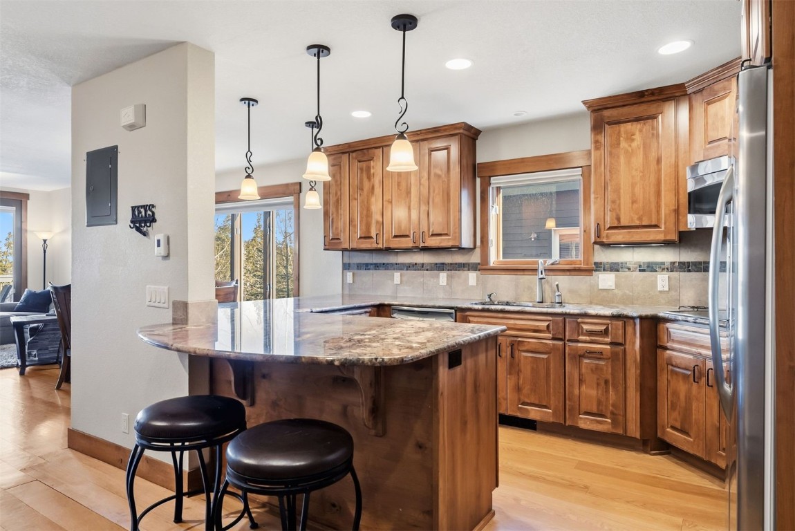 1682 Boreas Pass Road, Unit C Breckenridge, CO 80424 - Photo 5 of 50 Kitchen island with seating