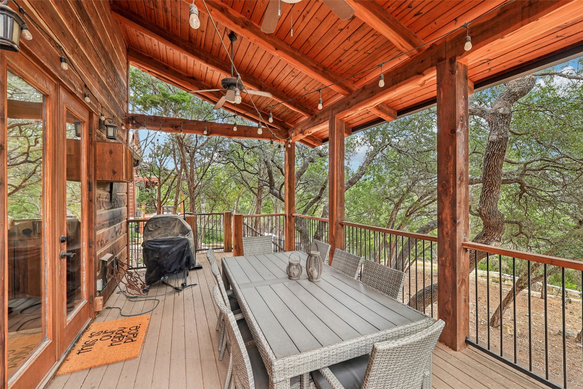 7229 Trident Jonestown, TX 78645 - Photo 25 of 34 a view of balcony with wooden floor and outdoor seating