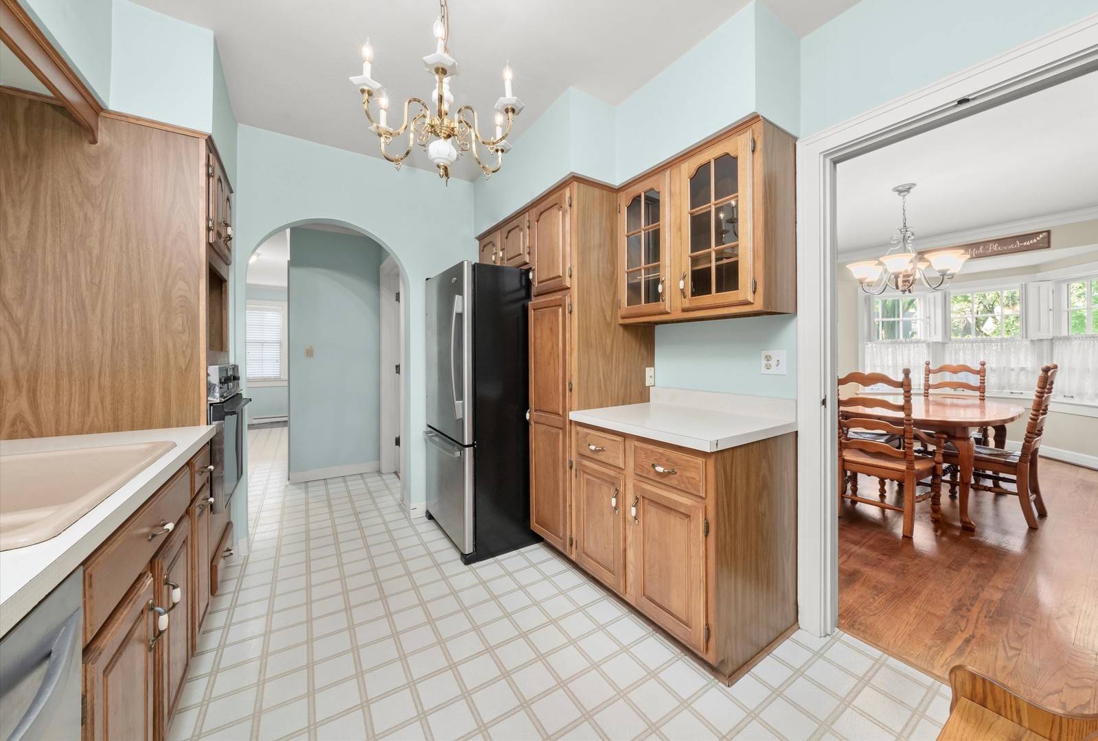 229 Country Club Road Chicago Heights, IL 60411 - Photo 12 of 31 a kitchen with stainless steel appliances granite countertop a refrigerator and a stove top oven
