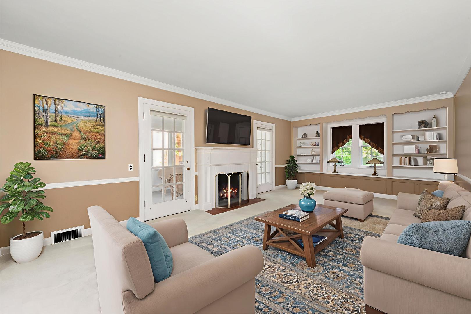 229 Country Club Road Chicago Heights, IL 60411 - Photo 8 of 31 a living room with furniture a fireplace and a potted plant