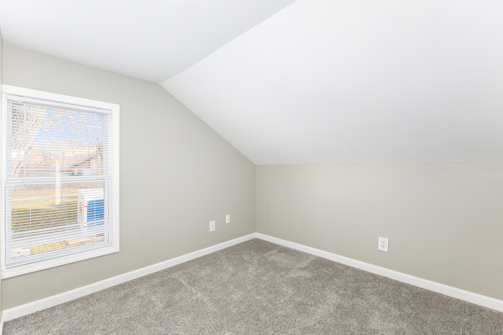 718 Clinton Street Lockport, IL 60441 - Photo 11 of 15 an empty room with a window