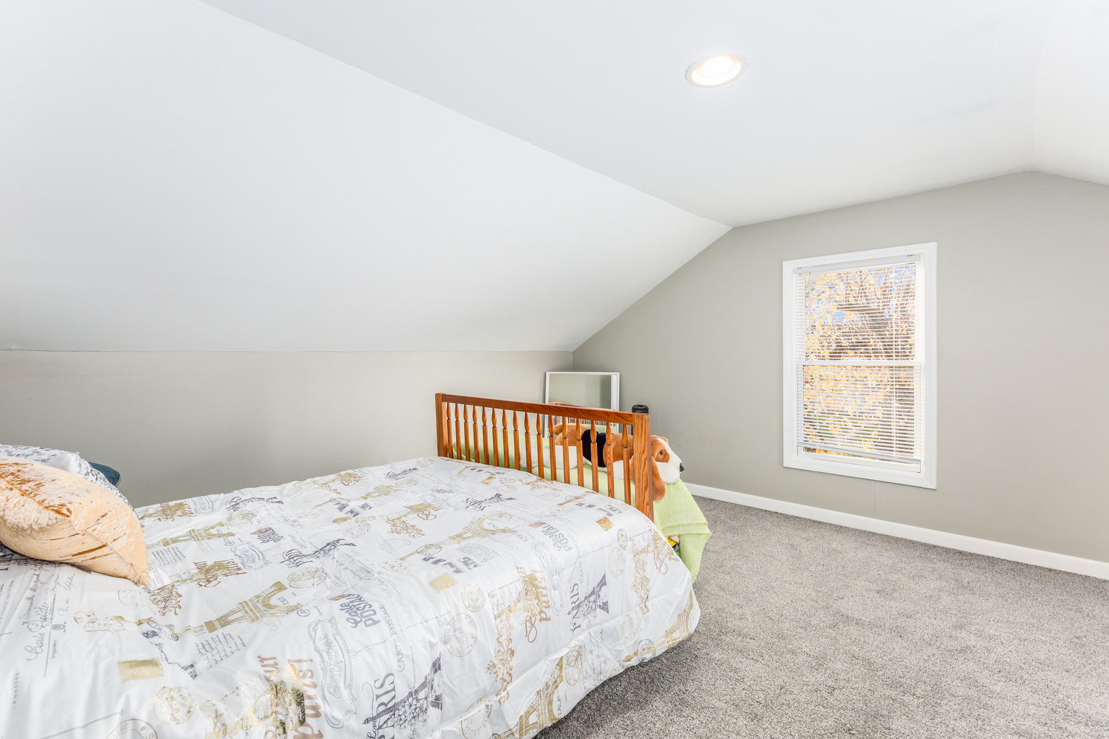 718 Clinton Street Lockport, IL 60441 - Photo 10 of 15 a bedroom with a bed and a window