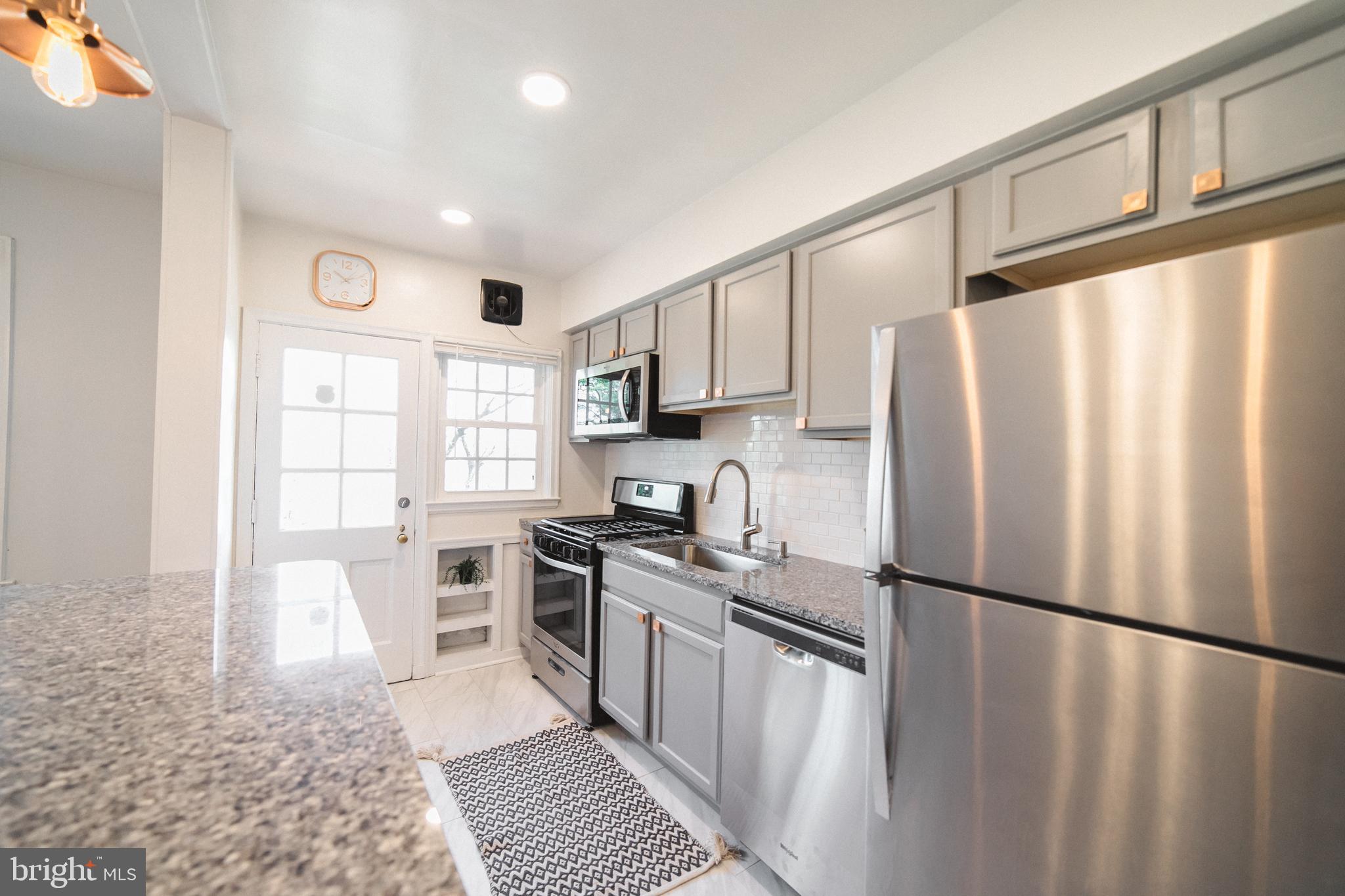 1332 Northview Road Baltimore, MD 21218 - Photo 12 of 30 Gorgeous kitchen w-granite and copper accents.