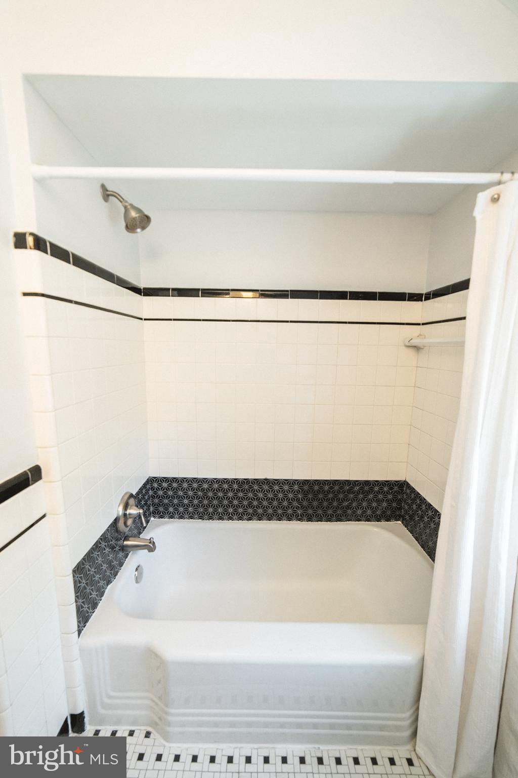 1332 Northview Road Baltimore, MD 21218 - Photo 21 of 30 Upper level bath with custom tile work.