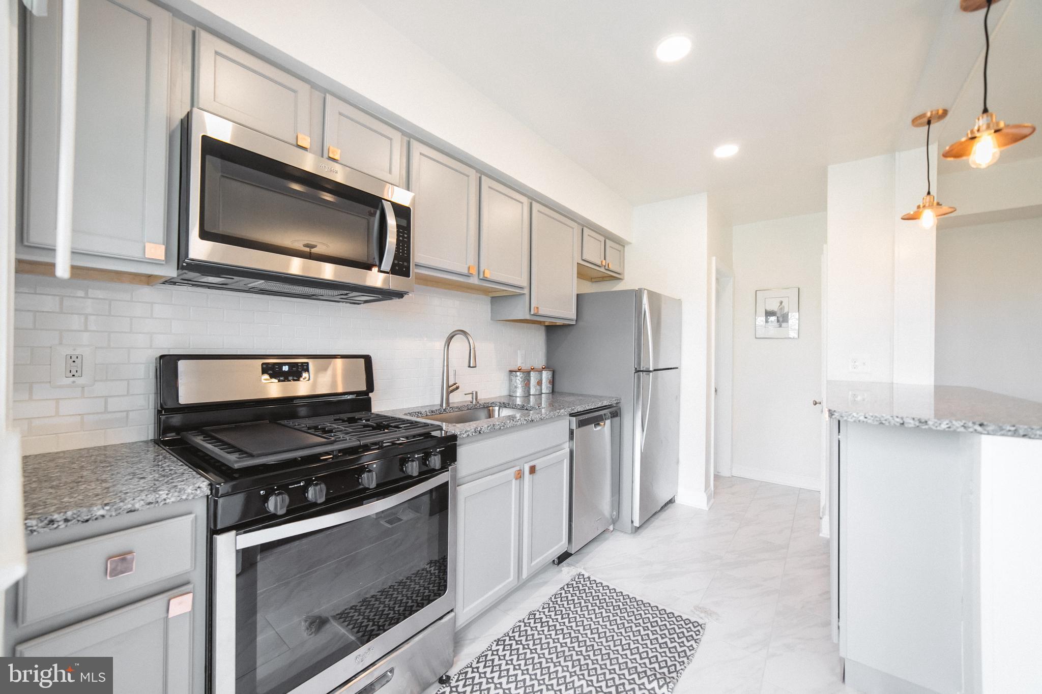 1332 Northview Road Baltimore, MD 21218 - Photo 10 of 30 Gorgeous kitchen w-granite and copper accents.
