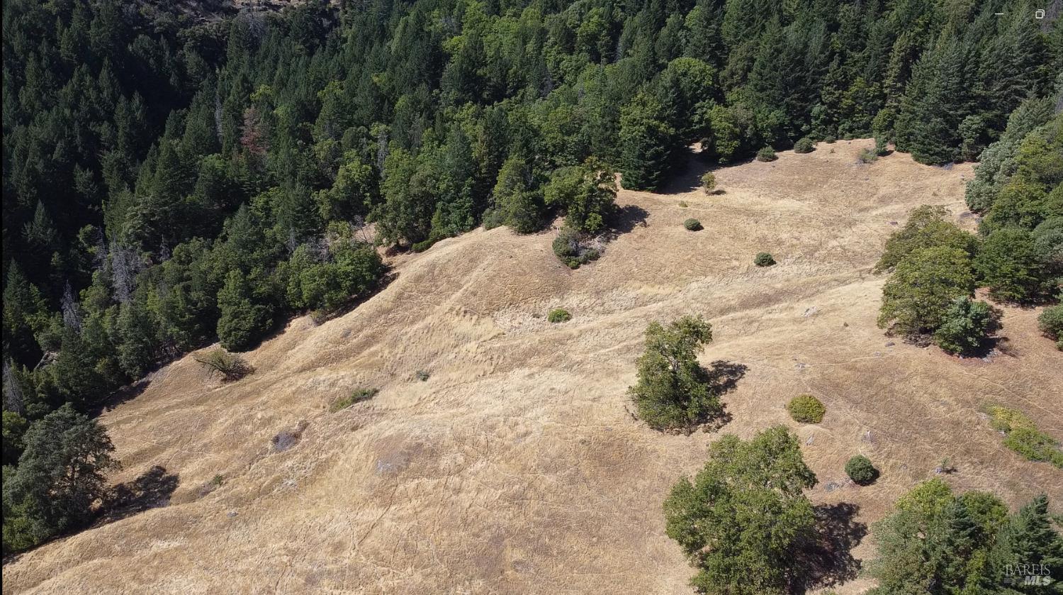 25645 18 N 34 Road Potter Valley, CA 95469 - Photo 3 of 8 a view of white house covered in snow