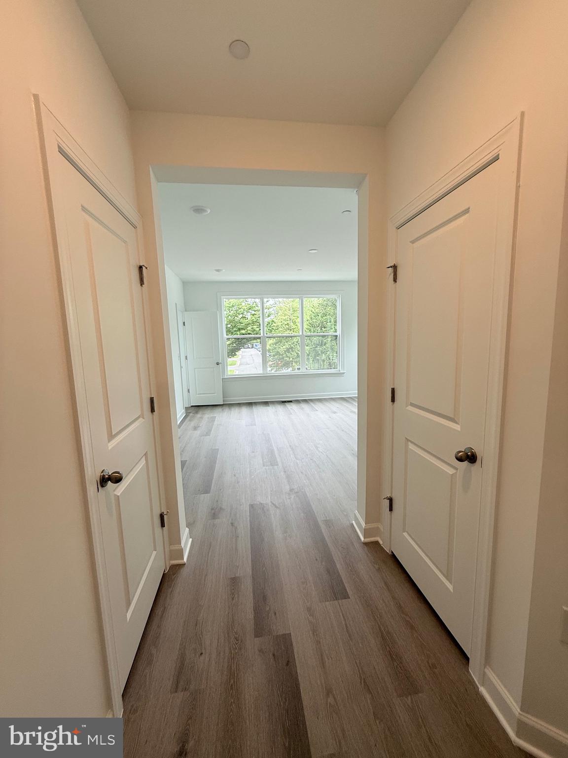 4900 Chelan Crossing Chantilly, VA 20151 - Photo 15 of 27 an empty room with wooden floor and a window